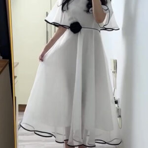 White Chiffon Maxi Dress With Black Trim And Floral Accent